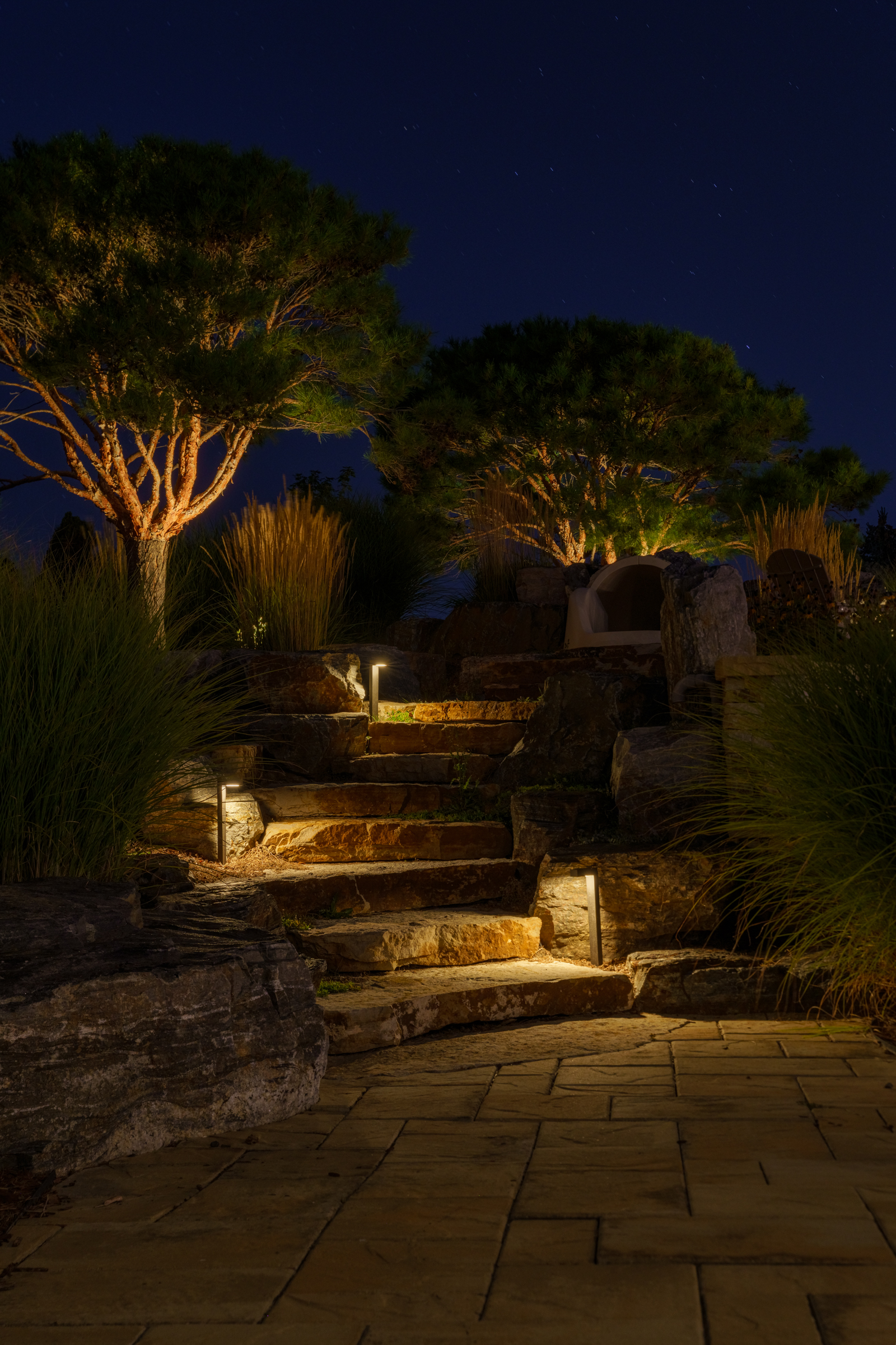 Warm white landscape lighting on stone steps